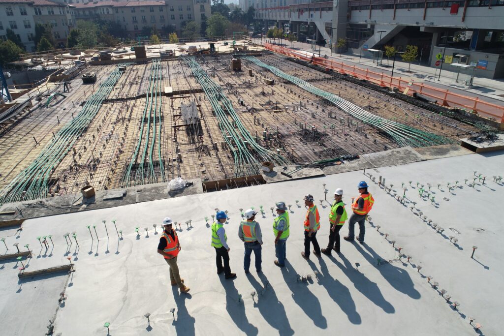 Surveyors assessing if they need collateral warranty on the building project they're working on